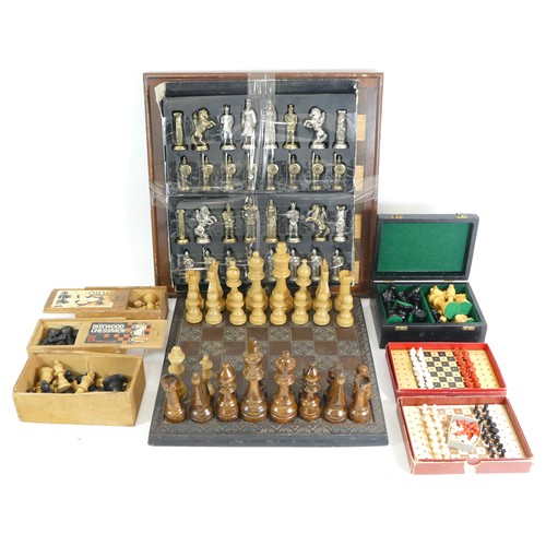 218 - Various 20th century and later carved chess sets to include three pocket/travel sets, four carved st... 