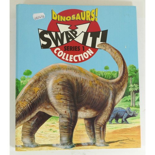 241 - A collection of 106 Dinosaurs 'Swop It' sticker cards by Orbis, together with 17 Topps sticker cards... 