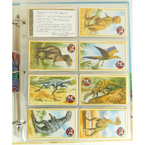 241 - A collection of 106 Dinosaurs 'Swop It' sticker cards by Orbis, together with 17 Topps sticker cards... 