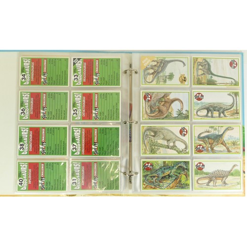 241 - A collection of 106 Dinosaurs 'Swop It' sticker cards by Orbis, together with 17 Topps sticker cards... 