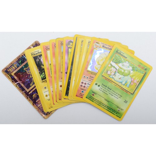 228 - Assortment of Pokemon trading cards comprising of three Charmander 46/102, Squirtle 63/102, Pikachu ... 