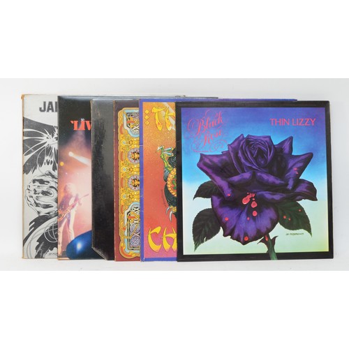 260 - A collection of six Thin Lizzy vinyl LPs to include albums such as Black Rose, Chinatown, and Live &... 