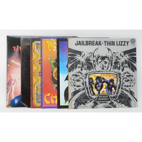 260 - A collection of six Thin Lizzy vinyl LPs to include albums such as Black Rose, Chinatown, and Live &... 