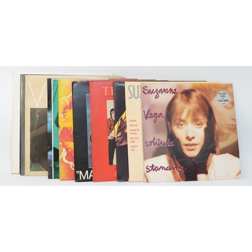 273 - A collection of twelve vinyl LPs to include artists such as Cheap Trick, Laura Nyro & Suzanne Vega (... 