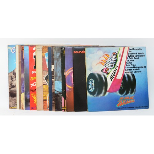 275 - A collection of fifteen vinyl LPs to include artists such as The Four Tops, 10CC & Country Legends (... 