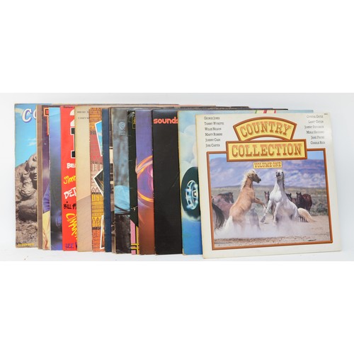 275 - A collection of fifteen vinyl LPs to include artists such as The Four Tops, 10CC & Country Legends (... 