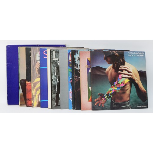 278 - A collection of fifteen vinyl LPs to include artists such as Todd Rundgren, Lou Reed & Simply Red (1... 