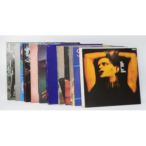 278 - A collection of fifteen vinyl LPs to include artists such as Todd Rundgren, Lou Reed & Simply Red (1... 