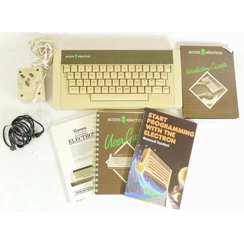 282 - A 20th century boxed Acorn Electron computer, complete with instructions and other related books