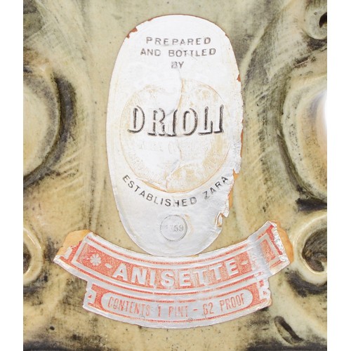 331 - Drioli, A vintage ceramic full anisette liqueur bottle, 34cm.