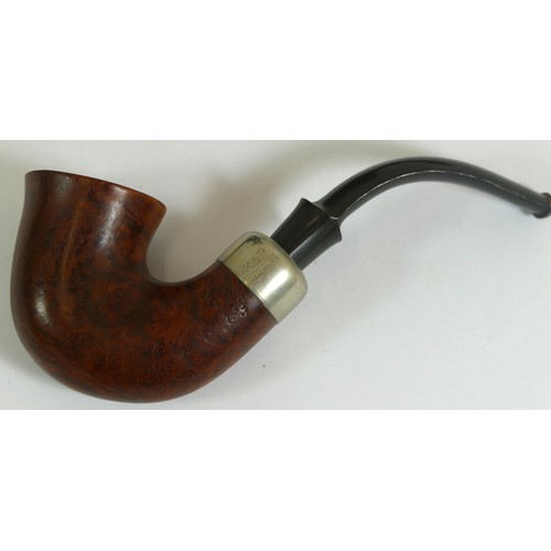 347 - Seven Irish Peterson pipes and a nautical three pipe stand