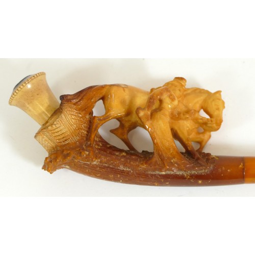 354 - A carved Meerschaum pipe of a lady with a horse, case