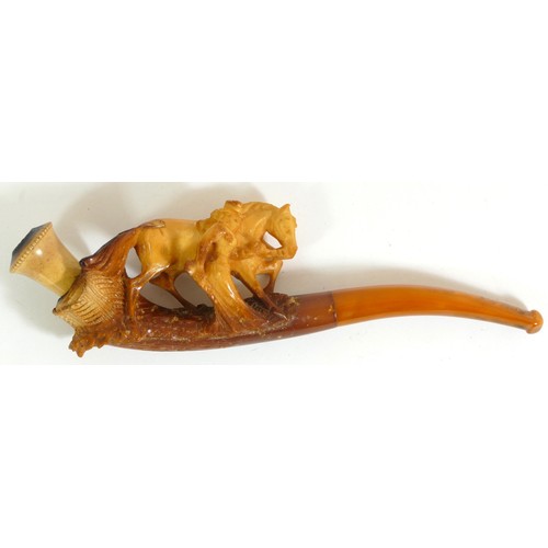 354 - A carved Meerschaum pipe of a lady with a horse, case