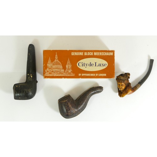 357 - A carved Meerschaum pipe of a 19th century lady, an Oppenheimer City de Luxe pipe, boxed with paperw... 