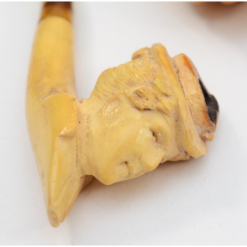 360 - A carved Meerschaum pipe in the form of a bunch of grapes, lacking mouthpiece, case and another depi... 