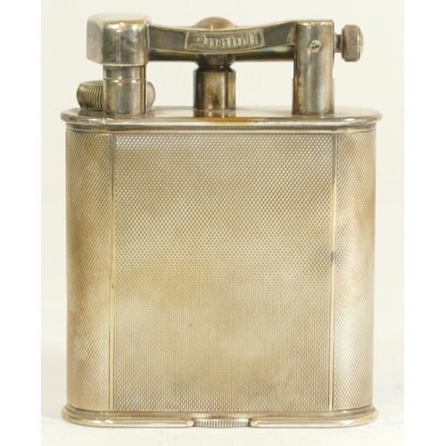 Dunhill, a silver plated giant table petrol lighter, c.1930's, pat. no. 390107, reg'd design no. 737418, Made in England, with an engine turned body, 10.5cm.