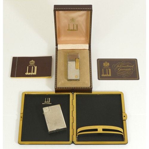 365 - Dunhill, a stainless steel and gilt Rollagas lighter, booklet, guarantee, case, a silver plated petr... 