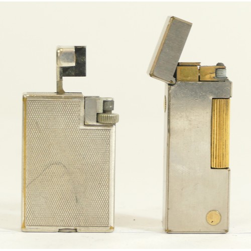 365 - Dunhill, a stainless steel and gilt Rollagas lighter, booklet, guarantee, case, a silver plated petr... 