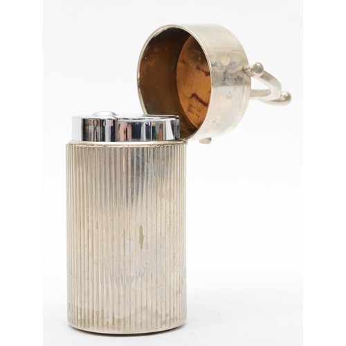 375 - Gucci, a chrome gas table lighter, in the form of an ice bucket, 9.5cm