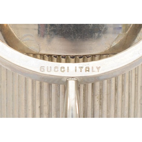 375 - Gucci, a chrome gas table lighter, in the form of an ice bucket, 9.5cm