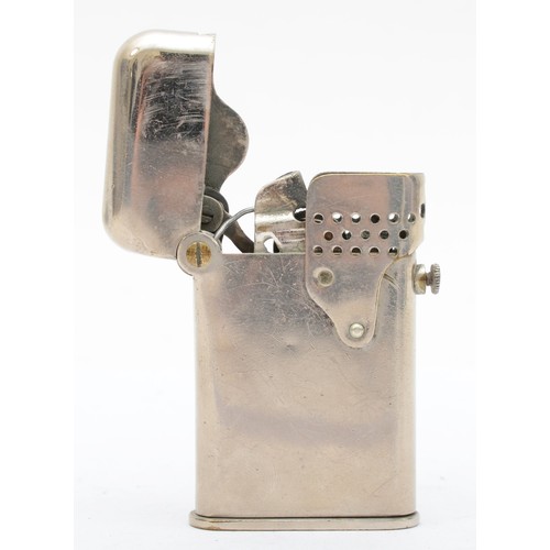 378 - Thorens, a vintage petrol lighter, BRIT. PAT JANUARY 29.1920, No 137.508, with wind guard, 6cm.