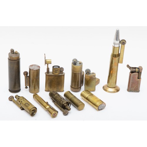 380 - Twelve various brass Trench Art and other petrol lighters