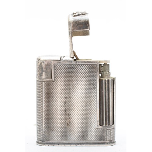 384 - A silver-plated 'The Charles' petrol pocket lighter, c. 1950, stamped 'The Charles Lighter', MADE IN... 