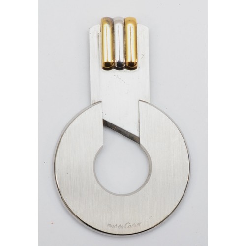 398 - Must de Cartier, a stainless steel and gold cigar cutter, c.1990, Made in France, 003286, 45mm