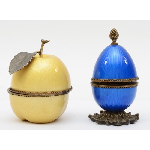 399 - A novelty table lighter in the form of an apple, by Evans, USA, 10cm and another in the form of a bl... 