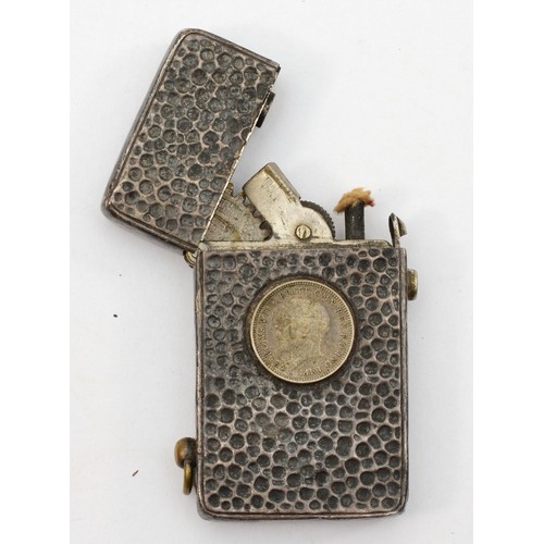 400 - An Orlik silver petrol lighter, the base engraved HALLMARKED SILVER ORLIK 1911, with hammered body a... 