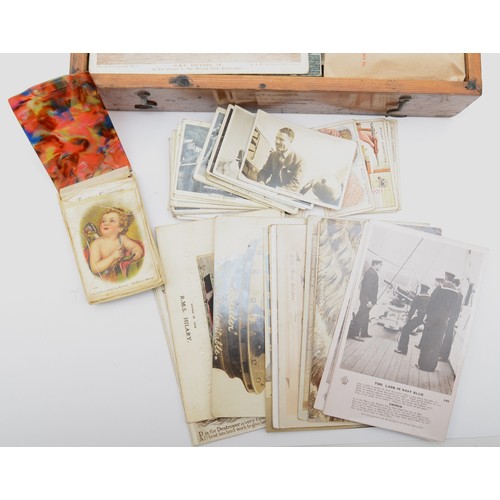 418 - A collection of Naval booklets and postcards, to include a schematic of Columbus, launched 1913, to ... 