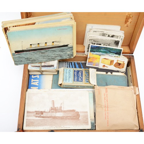 418 - A collection of Naval booklets and postcards, to include a schematic of Columbus, launched 1913, to ... 