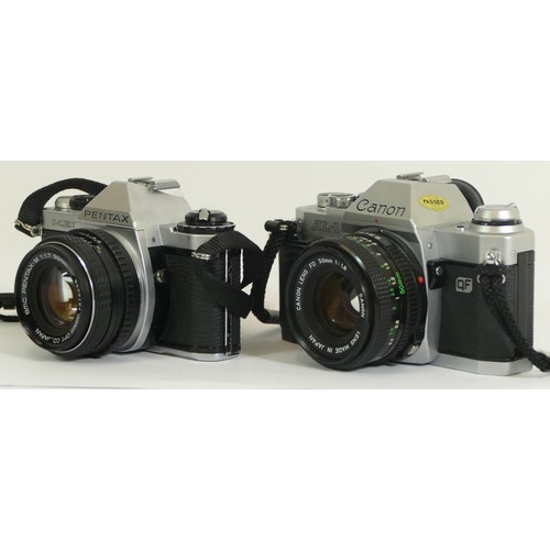 424 - Two cameras comprising of a Pentax ME Super with a SMC Pentax-M 1:1.7 50mm lens together with a Cano... 