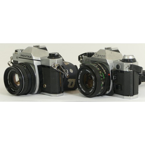 425 - Two cameras comprising of a Pentax K1000 with a Asahi Pentax-M 1:1.7 50mm together with a Canon AE-1... 