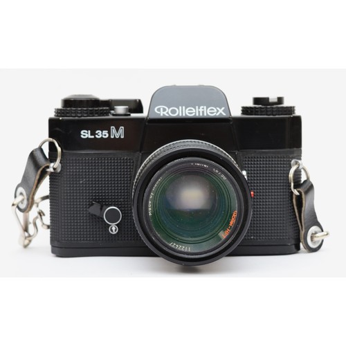 431 - A 1970s Rolleiflex SL35M SLR camera, body stamped 4826422, with planar 50mm lens (1122427) and Rolle... 