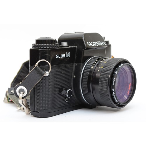 431 - A 1970s Rolleiflex SL35M SLR camera, body stamped 4826422, with planar 50mm lens (1122427) and Rolle... 