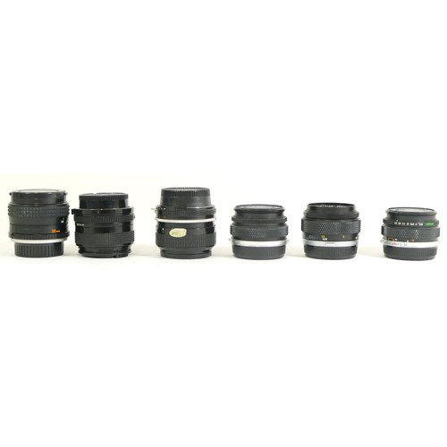 432 - Six various camera lenses comprising of two OM-System Zuiko Auto-W 28mm 1:2.8, Nikkor-S Auto 1:1.4 f... 