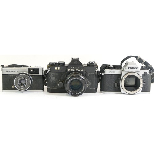 433 - Three cameras comprising of a Nikon FM2, Pentax Asahi ES camera and an Olympus Trip 35 camera with a... 