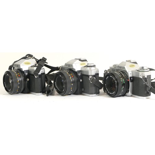 439 - Three assorted cameras comprising of a Minolta X-300 camera with a Minolta 1:1.7 50mm lens, a Minolt... 