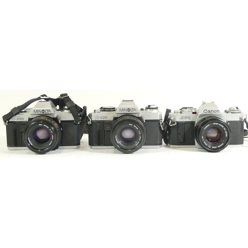 439 - Three assorted cameras comprising of a Minolta X-300 camera with a Minolta 1:1.7 50mm lens, a Minolt... 