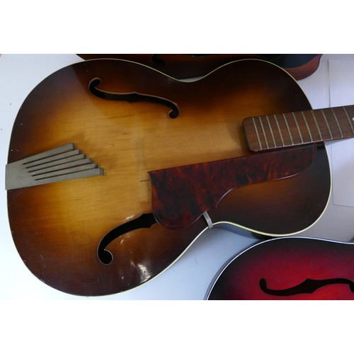 450 - A Hofner acoustic guitar, together with a Rolif acoustic guitar and a Egmond semi-acoustic guitar (a... 