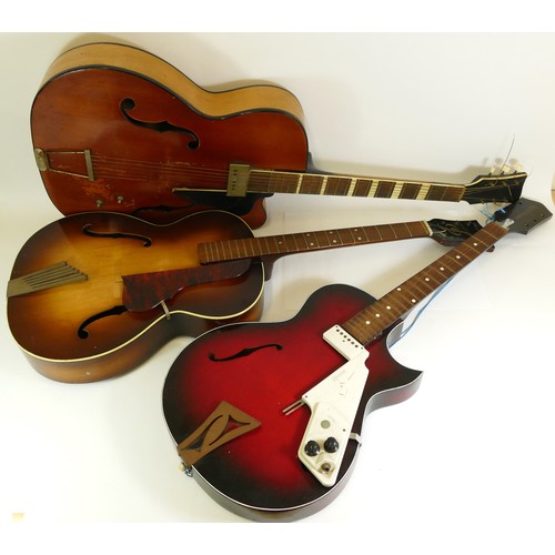 450 - A Hofner acoustic guitar, together with a Rolif acoustic guitar and a Egmond semi-acoustic guitar (a... 