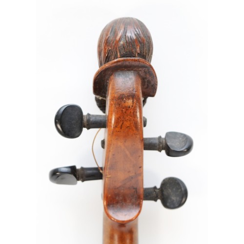 451 - A Victorian carved head violin, possibly by Jean-Baptiste Vuillaume, France, the carved head depicti... 