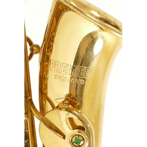 452 - A contemporary Premier alto brass saxophone, impressed 0919710, with engraved floral and leaf decora... 