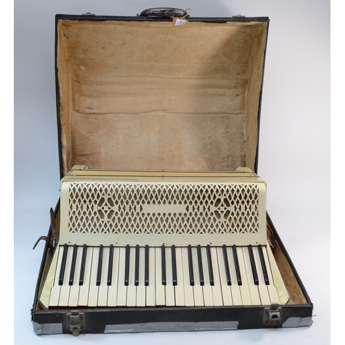 459 - A 20th century cased 120 button piano accordion, 41cm wide