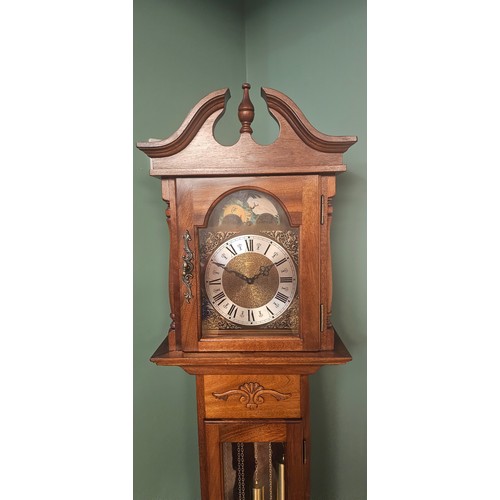 465 - A 20th century clock three weight longcase clock, with broken swan neck pediment, the brass dial wit... 