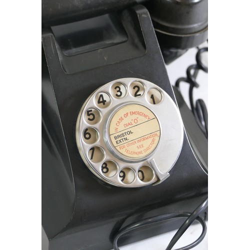 469 - Three 20th century black Bakelite electric telephones, each with chrome plated dialing plates