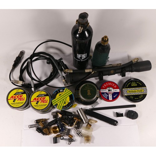 516 - A collection of air rifle and bottle parts and accessories including filling loops, PCP bottles, a S... 