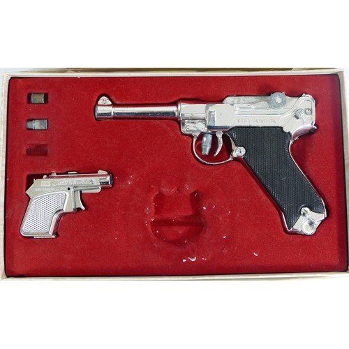 220 - A boxed Space Squadron Sonic Beam Gun, together with a boxed Lone Star 9mm Luger Presentation set (2... 