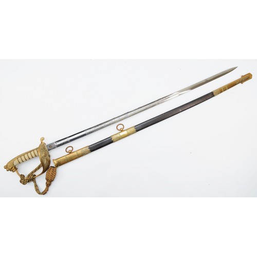 540 - A British early 20th century Naval Officers’ sword, regulation blade etched and polished with with r... 